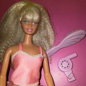 Barbie Doll Twirling Make Up With Brush